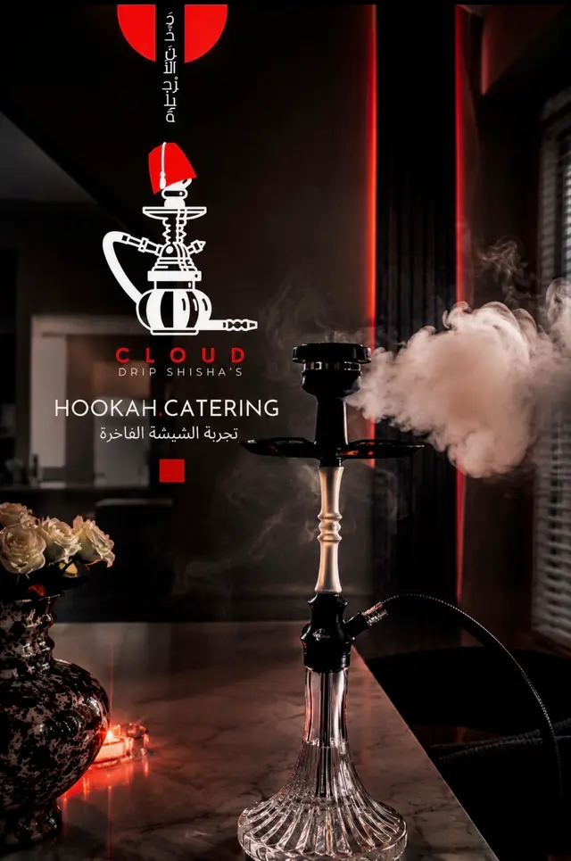 Hookah running against a dark wall, with the Cloud Drip mark overlaid