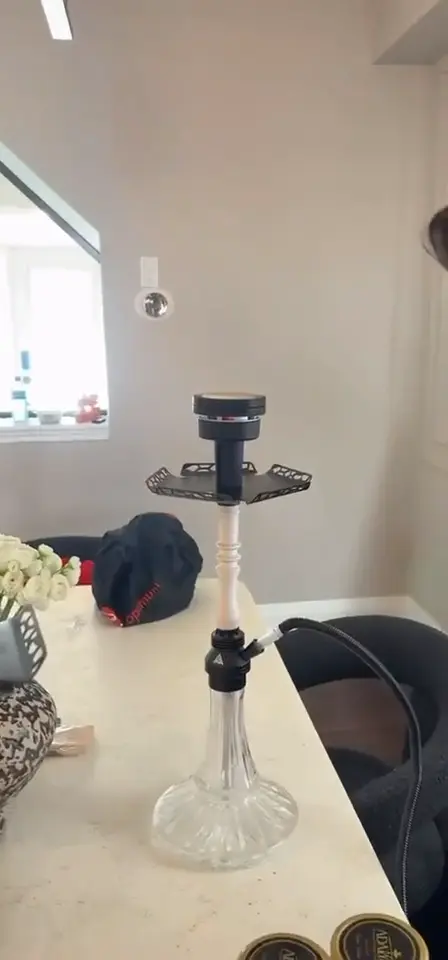 Hookah set up and lit in a private room before guests arrive